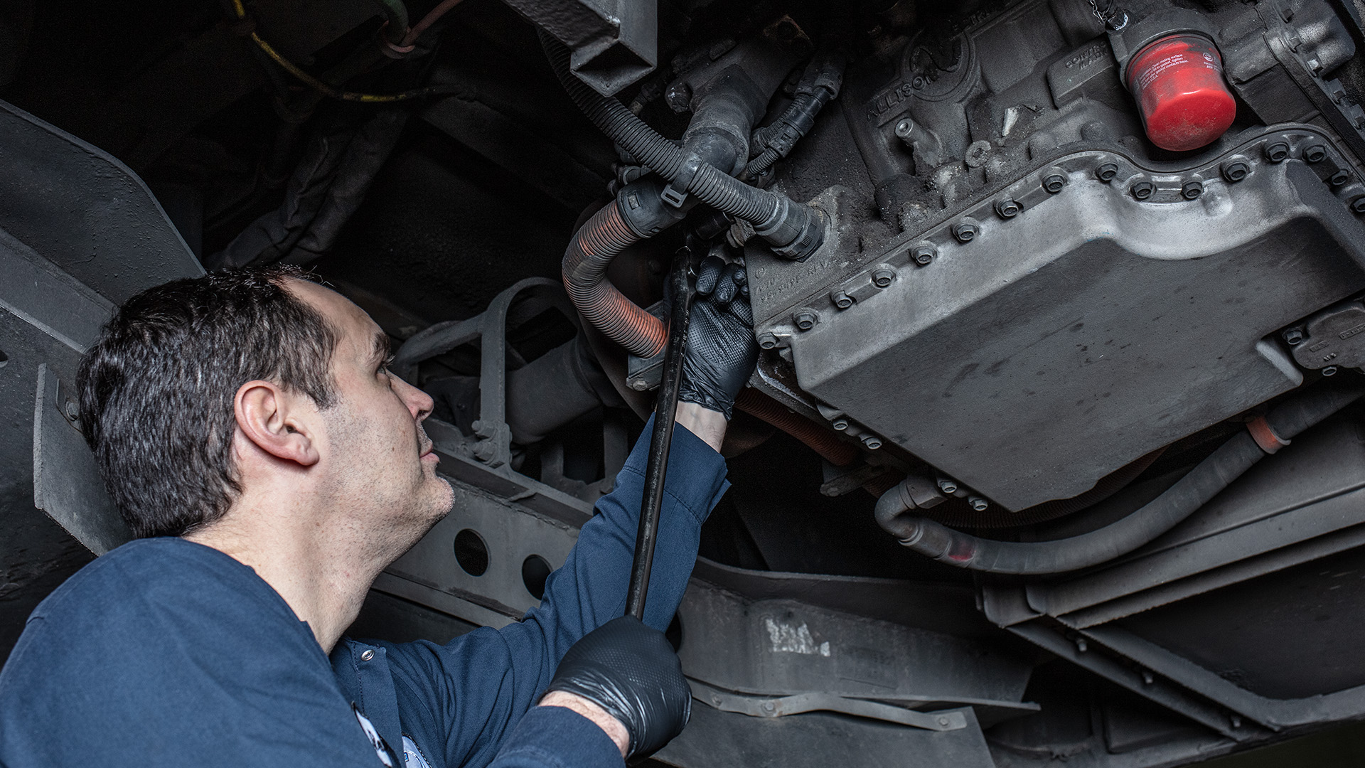 Technician working on an Allison H 40/50 EV Drive